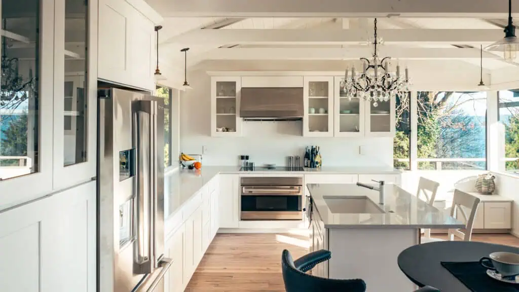 Vashon kitchen white cabinets and wood island detail