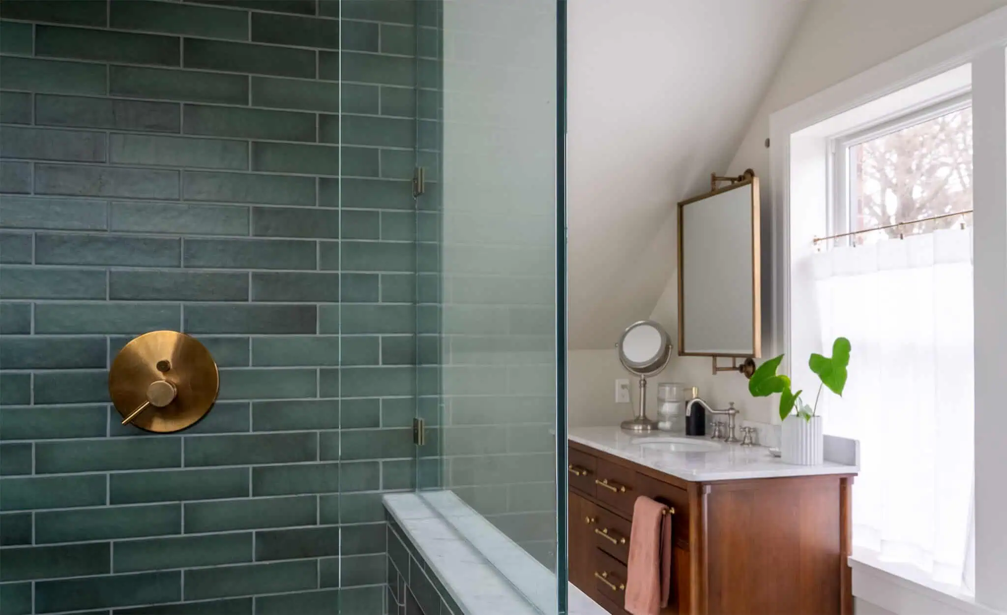 Maple Leaf master bathroom remodel with green tile and marble