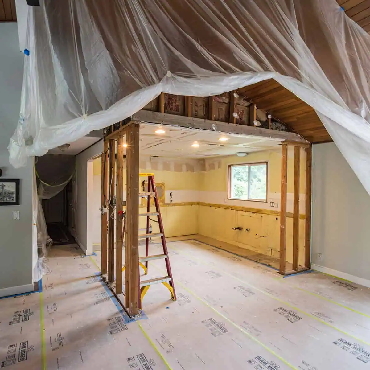 Remodel in progress showing dust control and floor protection
