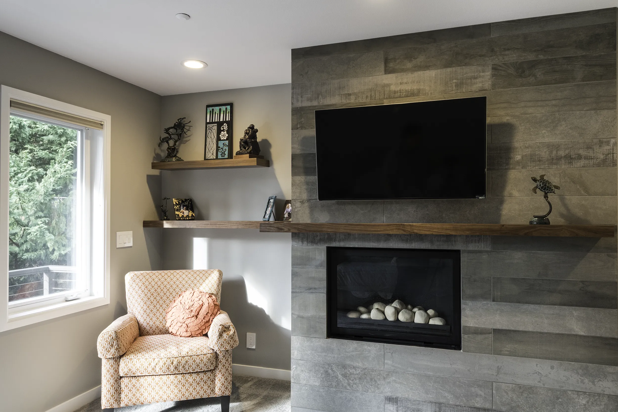 Sammamish primary bedroom fireplace with walnut wraparound mantel
