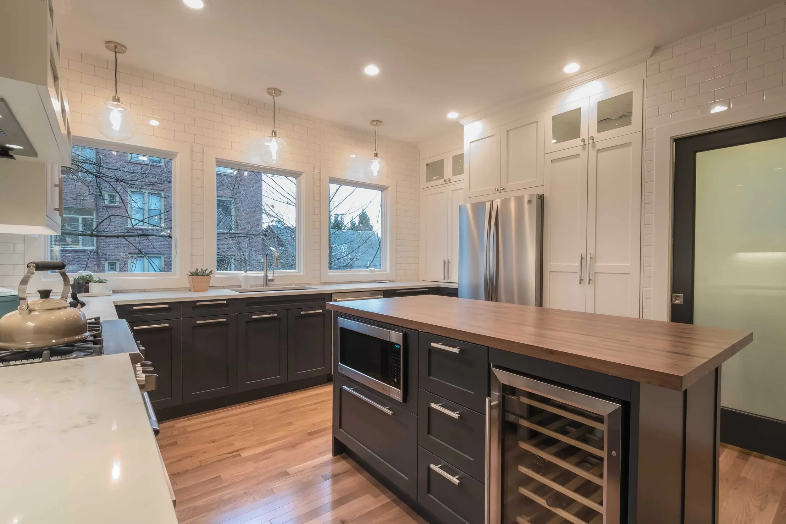 full tile wall with white subway tiles
