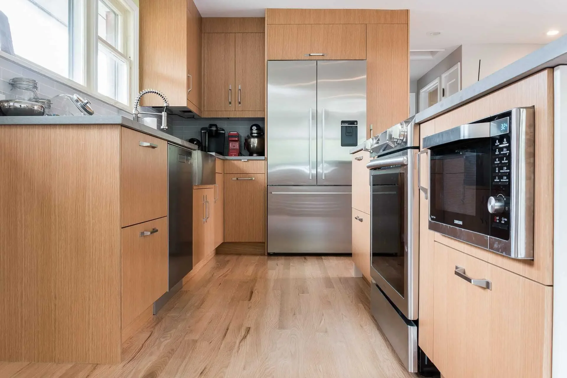 Custom rift white oak doors on IKEA frames